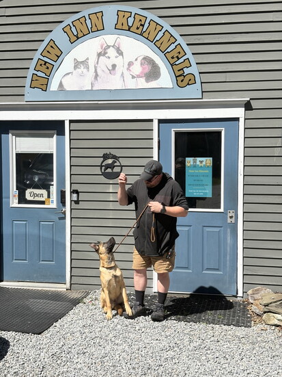 Don Kaufman with a puppy client at New Inn Kennels 