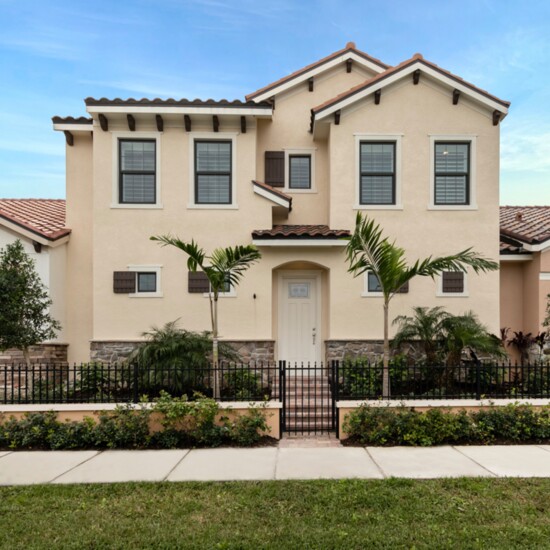 The exterior of an Arcata Del Sol two story townhome.