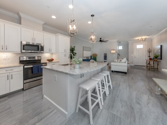 The kitchens in Arcata Del Sol townhomes feature G.E. Stainless steel Energy Star appliances and options for tile, sinks, fixtures and more. 