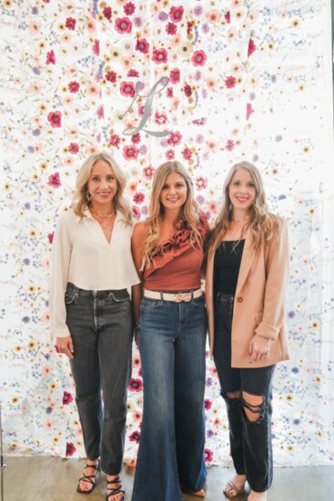 Lauren Ross, Lana Rowder, and Stefani Johnson, lookingGLASS Stylists dressed in clothing from Fab’rik in Hill Country Galleria