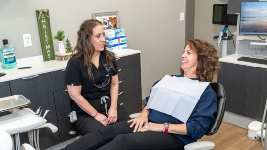 Dr. Samantha consults with a patient.