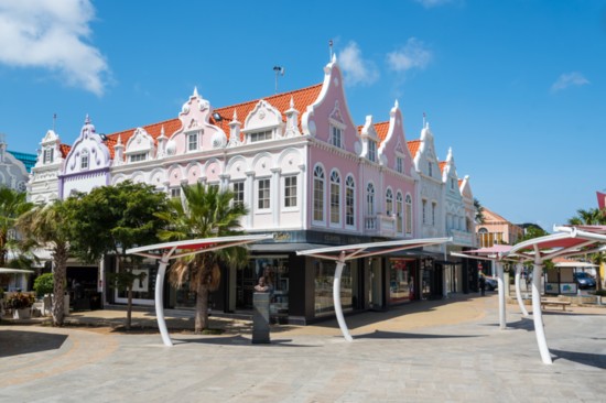 Luxury stores line a street in Aruba