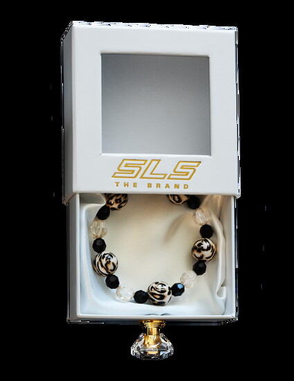 SLS the Brand “Wild Muse” Handmade Beaded Bracelet: $25  A little animal print never hurt anybody. The perfect stackable neutral accessory with a wild side.