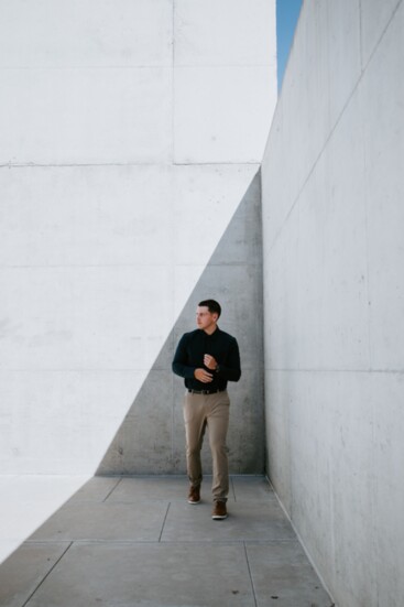 On Jackson: Navy Commuter Long Sleeve Button Up Shirt, Khaki Commuter Pant and Reversible Dress Belt. 