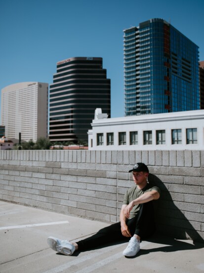 On Jackson: Black True Classic Trucker Hat, Military Green Active Crew Neck, Black Active Joggers.