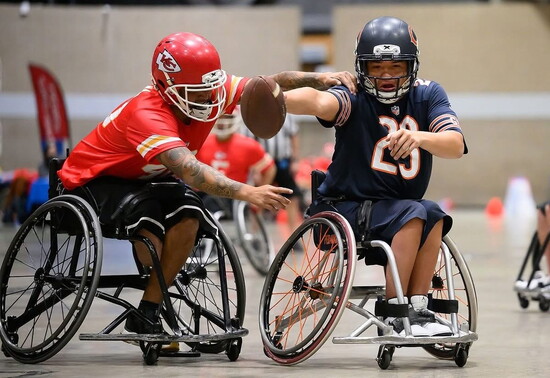 Noah Blue Elk Hotchkiss gives his competitor the stiff arm 