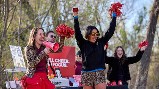 Kim Russick from lululemon and miles.Beyond Race Director Mandy Mullen bring the energy, cheering on runners as they crush their goals!