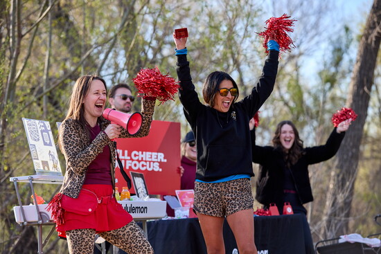 Race Director Mandy Mullen, with Kim Russick, Store Manager of the Fort Collins Lululelmon,  and Lululemon ambassador cheer on runners 