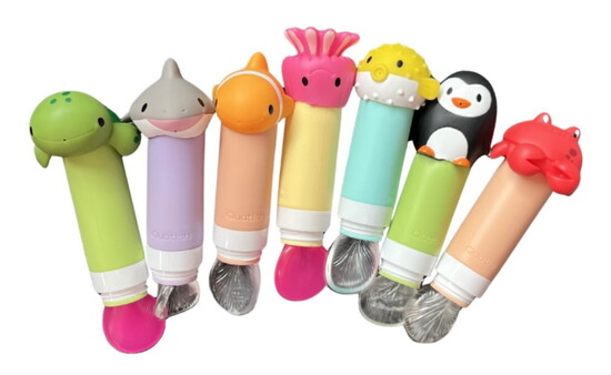 FunShine prototype: Early character-cap applicator designs the team tested while refining both function and fun.