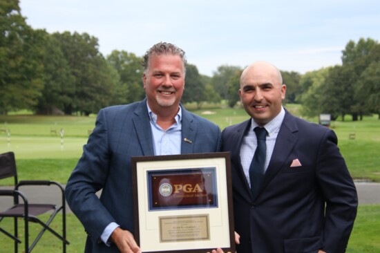 Peter Egazarian (right) accepts the Connecticut PGA Player Development Award from Howie Friday, President of the Connecticut PGA