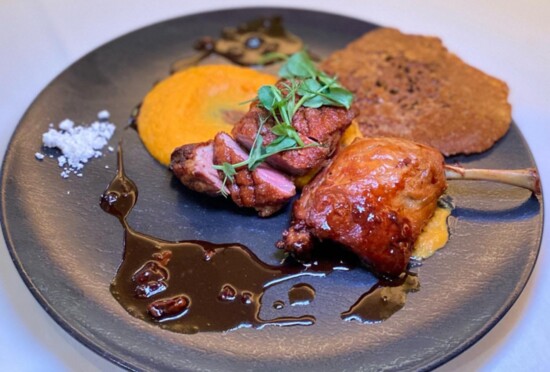 Dry Aged Jurgielewicz Duck, Crispy skinned medium cooked duck breast and confit leg, served with sweet potato puree and cherry duck jus.