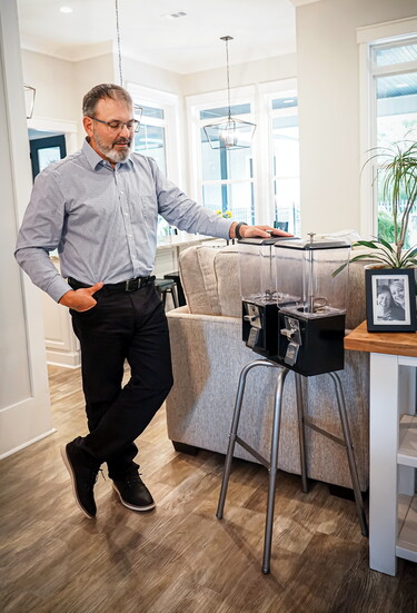 Charles displaying his restored gumball machine