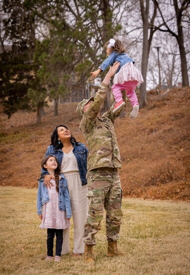 Major Gregory Bassett, Monica Bassett, and their girls
