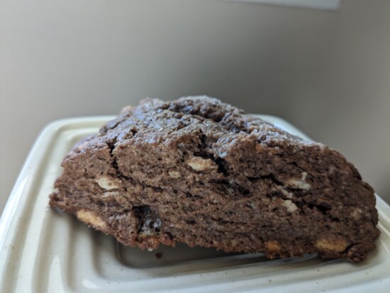 A tender Chocolate Almond Scone with sweet almond tucked throughout.