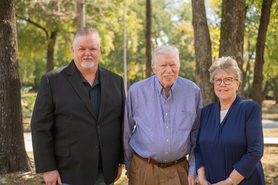 Michael MacFarlane, Senior Accounting Manager; Robert "Bob" MacFarlane, Managing Director; and Linda MacFarlane, Senior Director. 