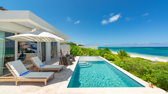 Infinity pool lover looking the Atlantic Ocean.