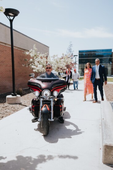 Coach loves his motorcycle