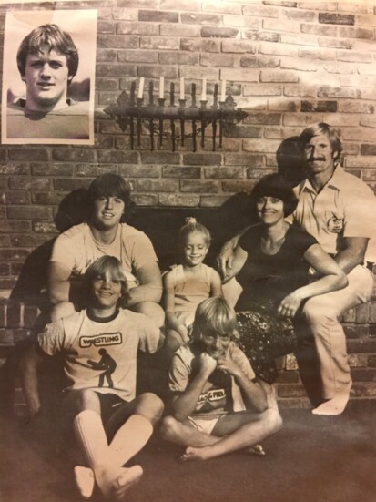 Coach with siblings back in the day