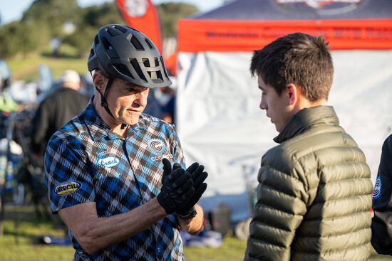 Gordon Reese helping one of the riders.