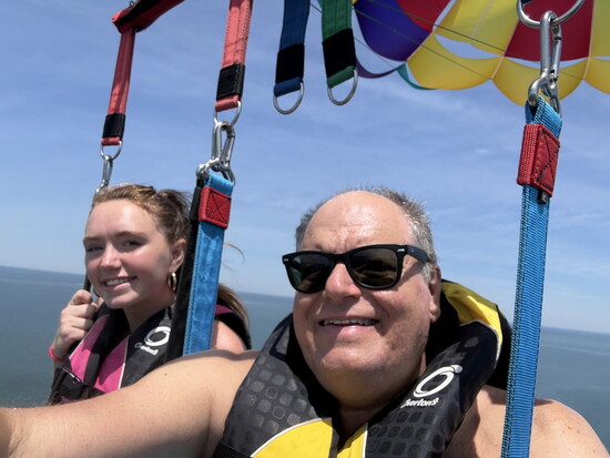 Jane Condran and Ed Condran Parasailing over Ocracoke