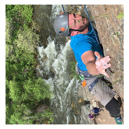 "Feet" Jensen rock climbing