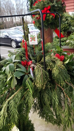 An evergreen holiday arrangement at Draghi Farms