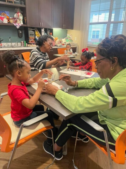 Kids, seniors, and crafts make for a great afternoon at Heartis in Fayetteville. Photo credit: Heartis 