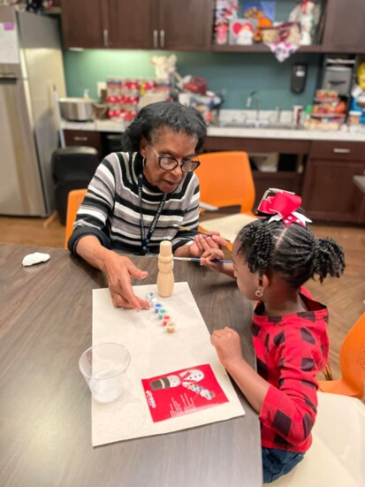 Seniors love to teach the littles. Photo credit: Heartis