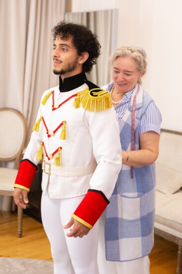 Alejandro González is being fitted by an artisan costumer in New York City. (Photo by Hannah Hudson)