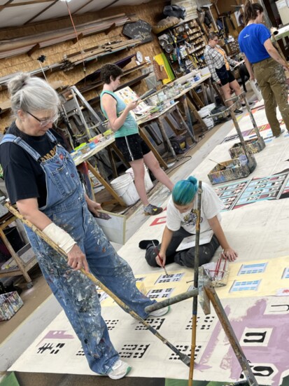 Cobalt Studios artists work on a set design. (Photo provided)