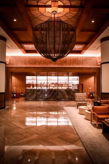 The lobby draws inspiration from Oklahoma’s pastoral landscape, including earth and sky.