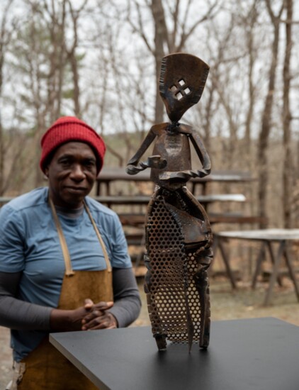 Olu Amoda with his work