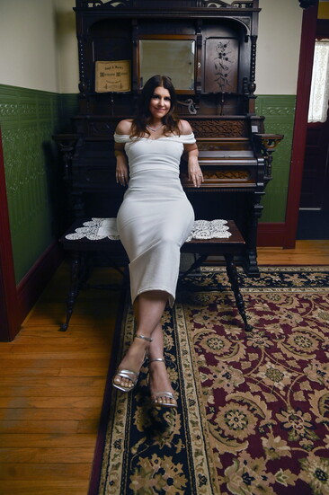 On Bethany: White Off-the-Shoulder Dress features elegant ruching and a body-hugging silhouette.