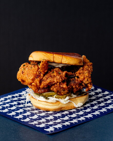 The Valley Sando, made with Cholula buffalo hot honey and roasted garlic aioli on a toasted potato roll