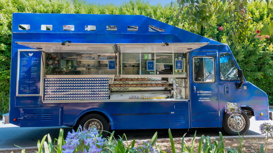 The custom food truck in CHX’s signature blue