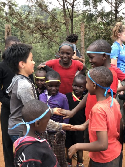 Teaching a game to Center of Hope students.