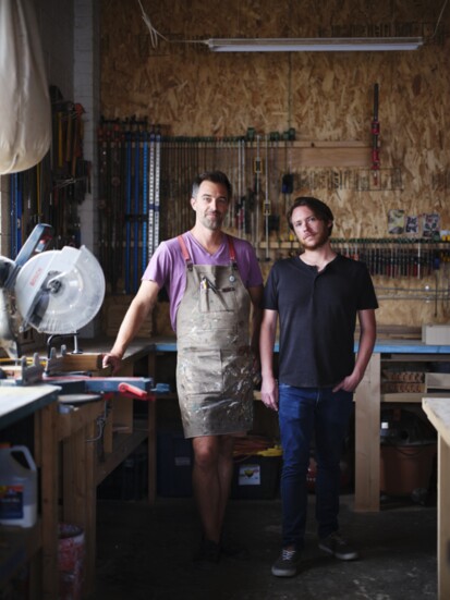 Matthew (left) and Chris Scott (right) pose in wood shop. They are two of the three founders of ReCreative.