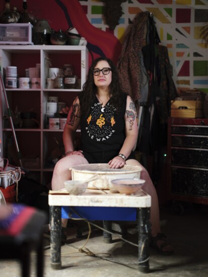 Kelly Eigenberger, programs director and potter, poses in the ceramics studio.