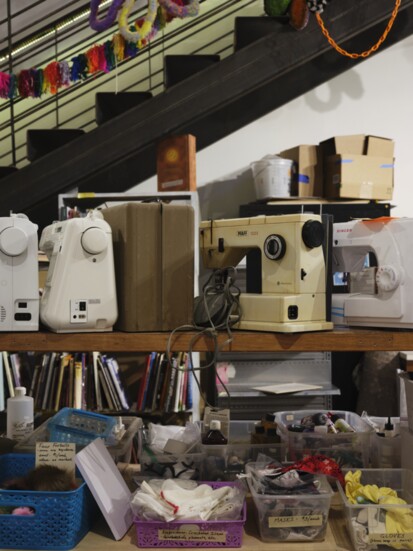 Detail of sewing machines in the retail/program space.