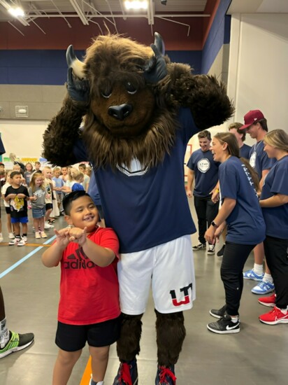 Students have a blast with Brooks, the Bison, the Utah Tech mascot