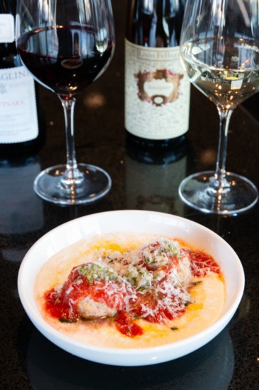 Enoteca Emilia’s veal meatballs on top of moretti polenta, with swiss chard, san marzano tomato, and gremolata.  