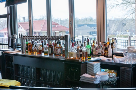 The bar’s windows open in warmer weather to serve patrons outside. 