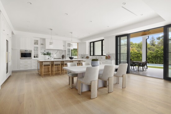 The kitchen and breakfast area feature an open floor plan