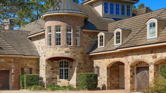 The circular drive leads to an oversized 4 car garage and porte-chochere - The Mike Seder Group