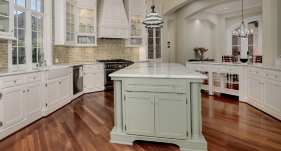 Catering kitchen with marble island and glass front cabinetry-The Mike Seder Group 