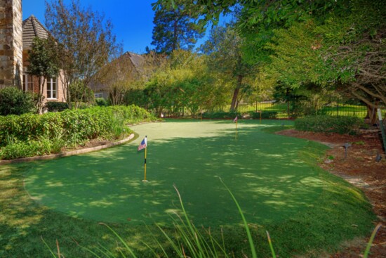 Backyard oasis with putting green