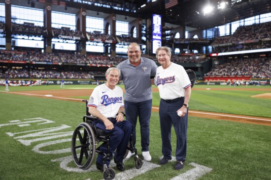 Texas Governor Greg Abbott joins Mike and "Pudge" Rodriguez. Photo courtesy of the Texas Rangers.