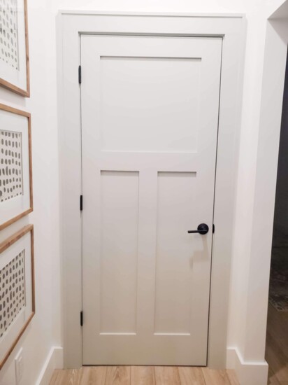 Painting interior doors a soft neutral makes a big impact.  This door in Sherwin-Williams Repose Gray. Photo: @homeforseven 