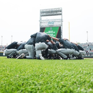 team%20prayer%20before%20the%20opening%20game%20of%20the%20cws-300?v=1