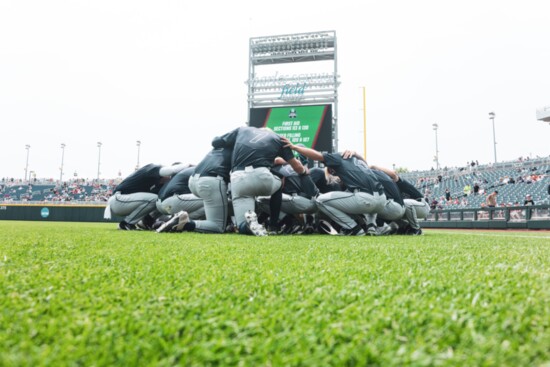 Team Prayer before the opening game of the CWS